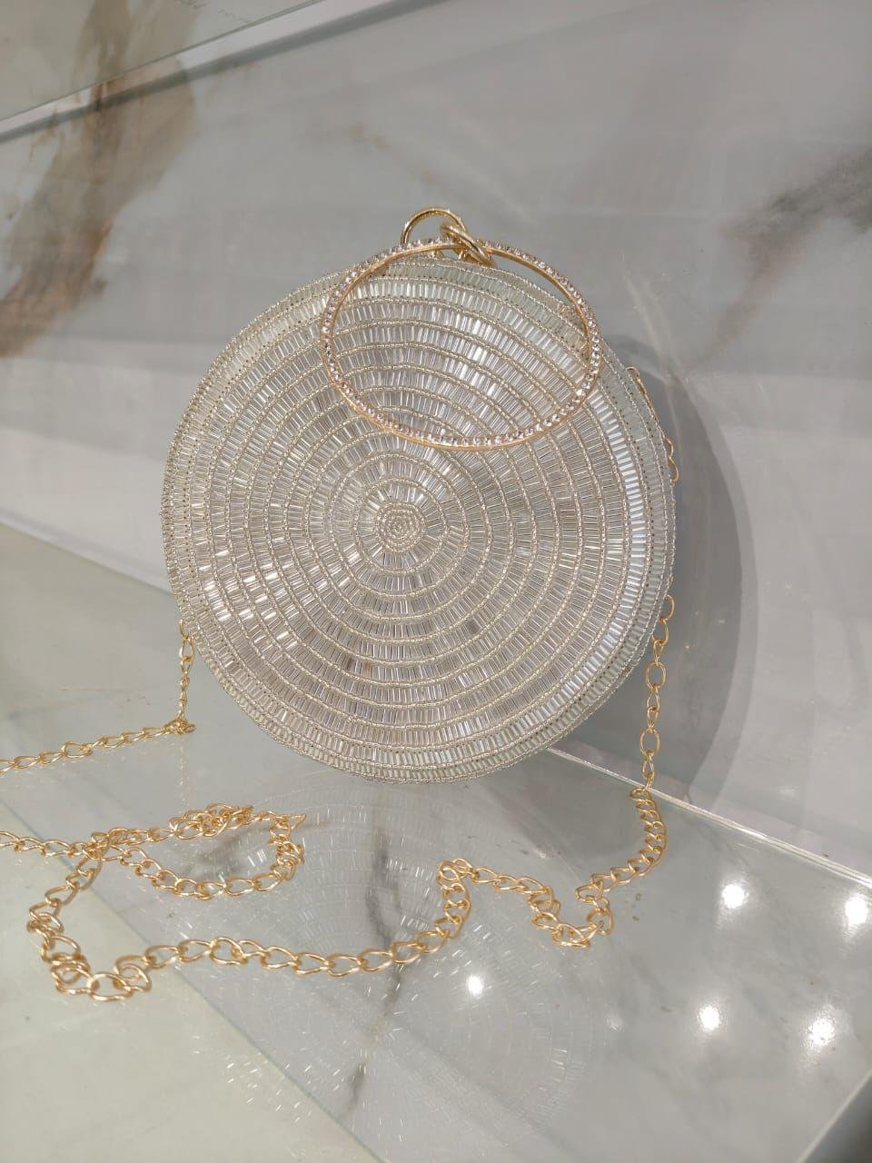 Shimmering Silver Woven Circle Clutch with Chain Strap