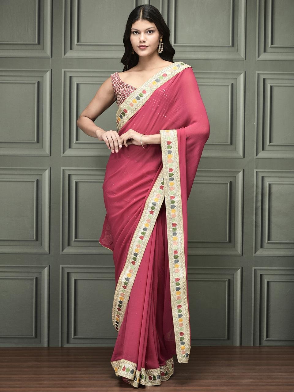 Pink georgette with multicolor border saree: